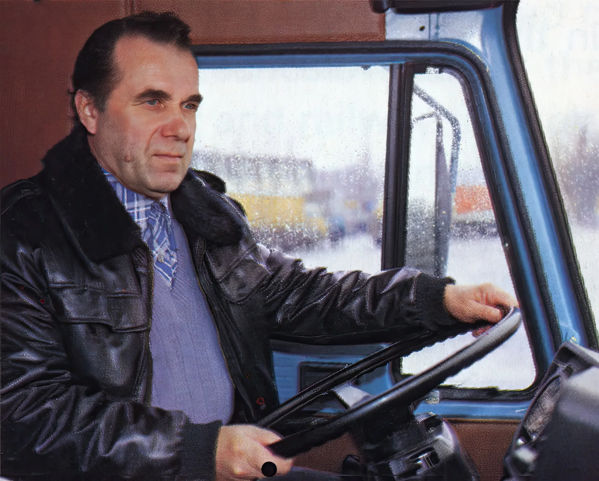 Portrét vodiča v kabíne vozidla
